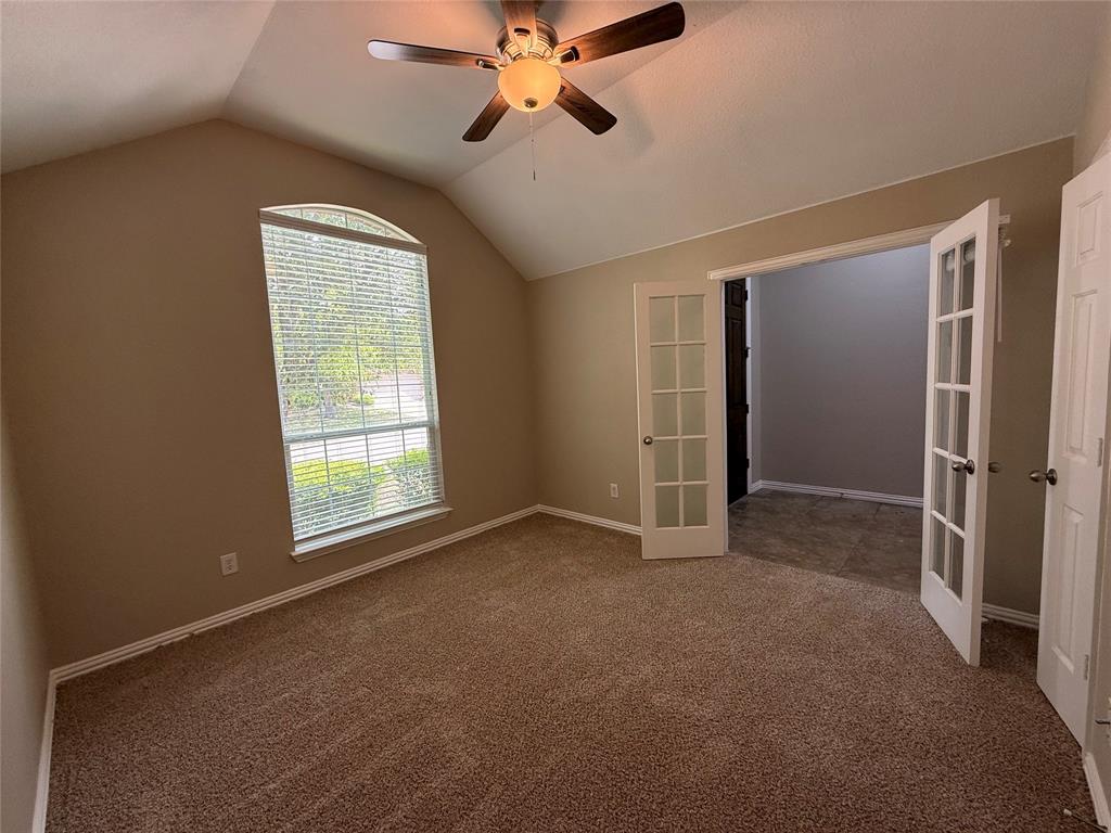 108 Cole Street Forney, TX 75126 - Photo 19 of 39 an empty room with fan and windows