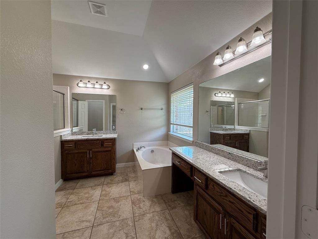 108 Cole Street Forney, TX 75126 - Photo 24 of 39 a large kitchen with a large stove a sink dishwasher and a refrigerator