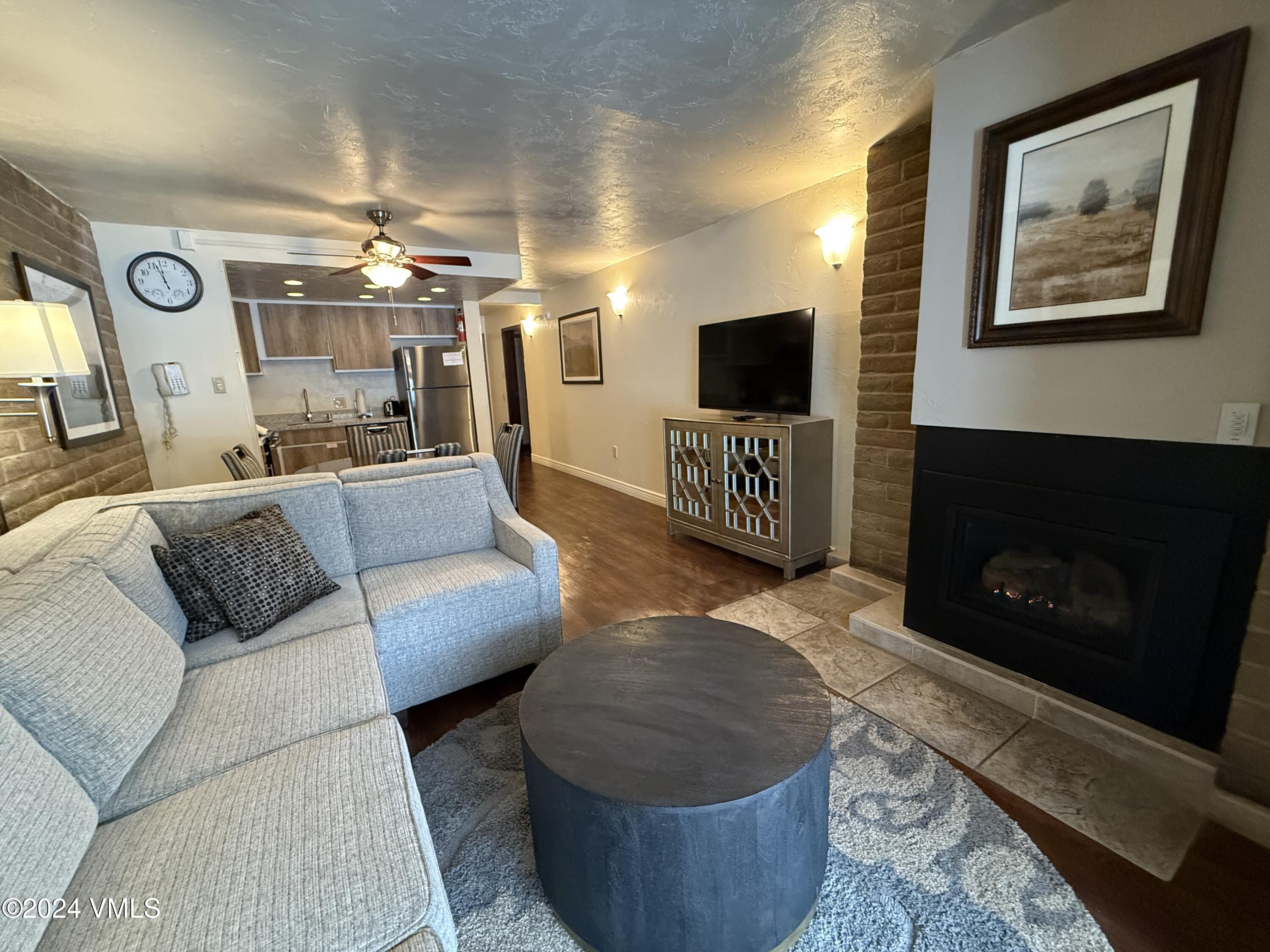 1020 Vail View Drive, Unit 121545 Vail, CO 81657 - Photo 5 of 22 1215 living room from patio