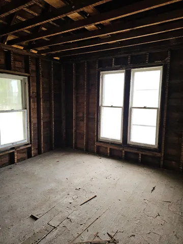 a view of empty room with a window