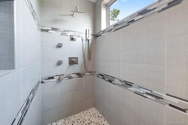 a close view of a shower in the bathroom