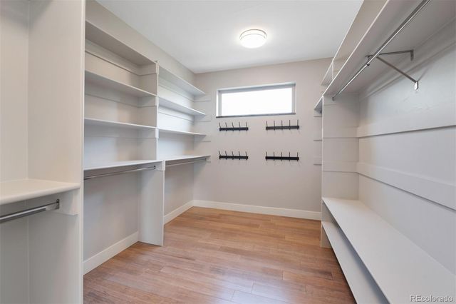 a view of an empty walk in closet