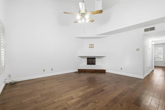 an empty room with fan