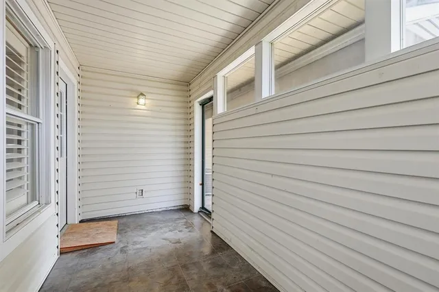 a view of a house with white door