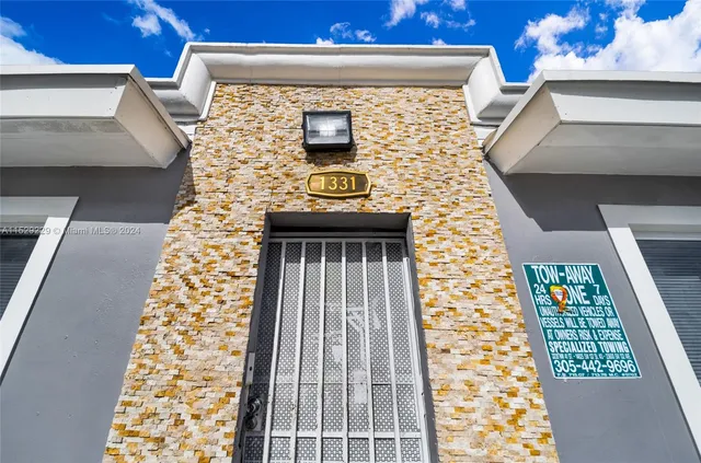 a swimming pool with outdoor seating