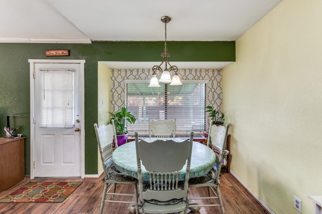 1301 Wayne Drive Round Rock, TX 78664 - Photo 11 of 21 a dining room with furniture and window