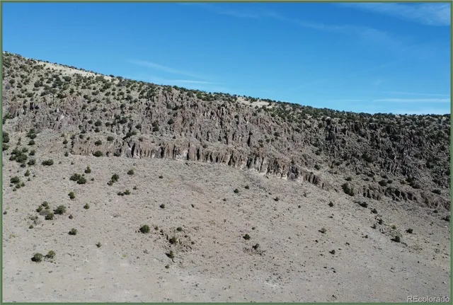 a view of a road with a big yard