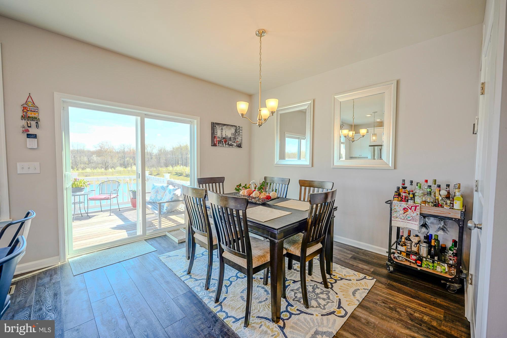 15 Turin Way Mount Laurel, NJ 08054 - Photo 13 of 36 a view of a dining room with furniture and wooden floor