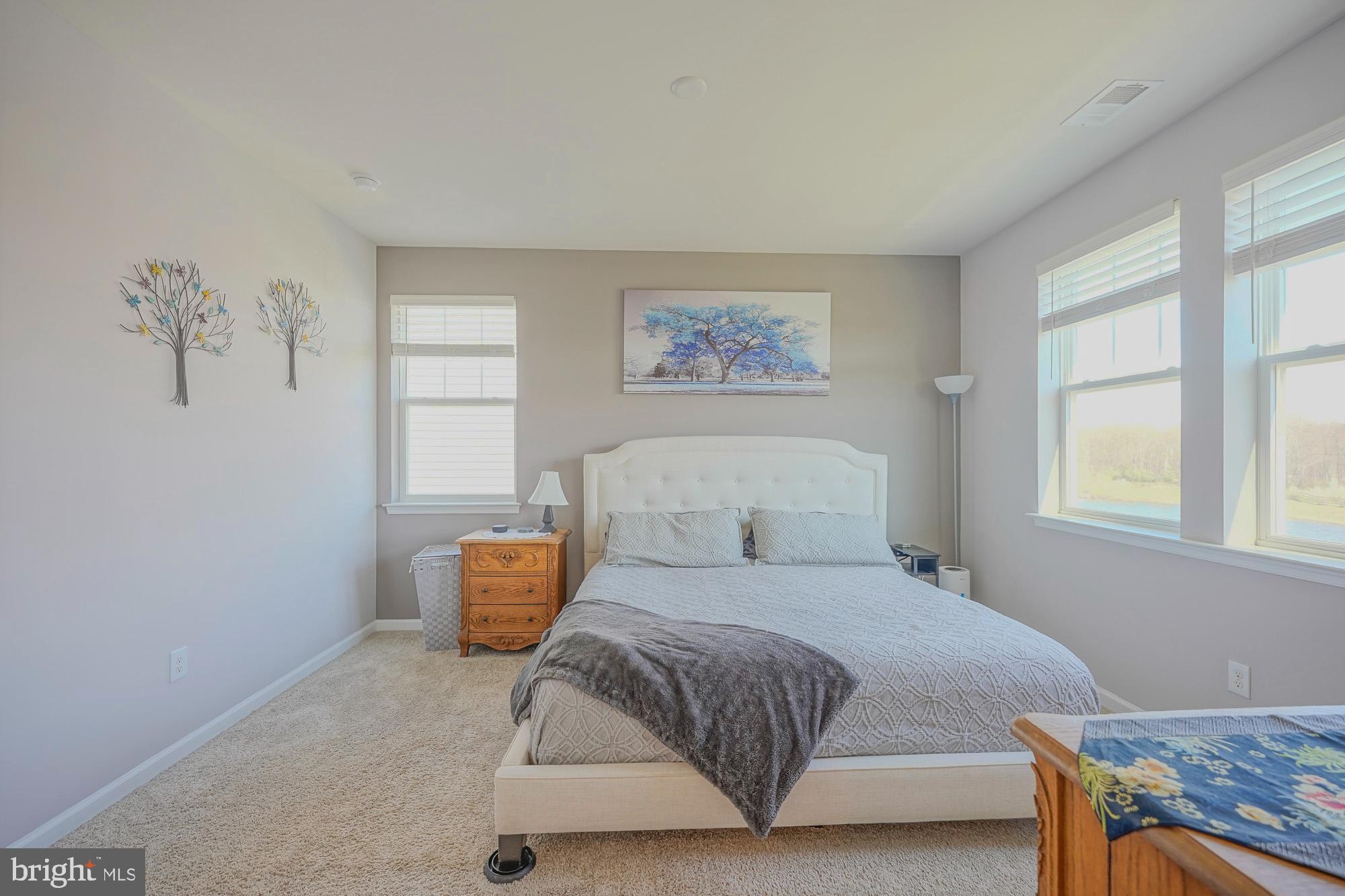 15 Turin Way Mount Laurel, NJ 08054 - Photo 19 of 36 a bedroom with a bed and wooden floor
