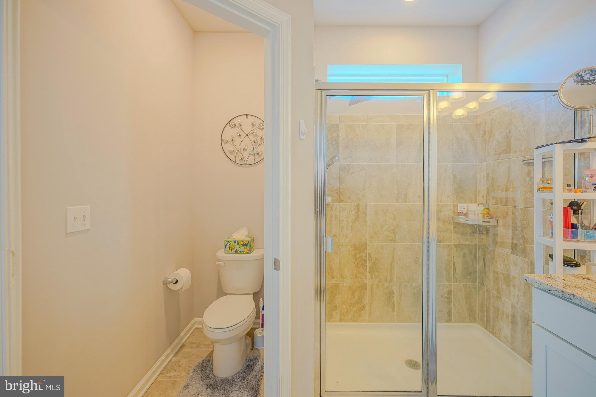 15 Turin Way Mount Laurel, NJ 08054 - Photo 22 of 36 a bathroom with a shower and a toilet