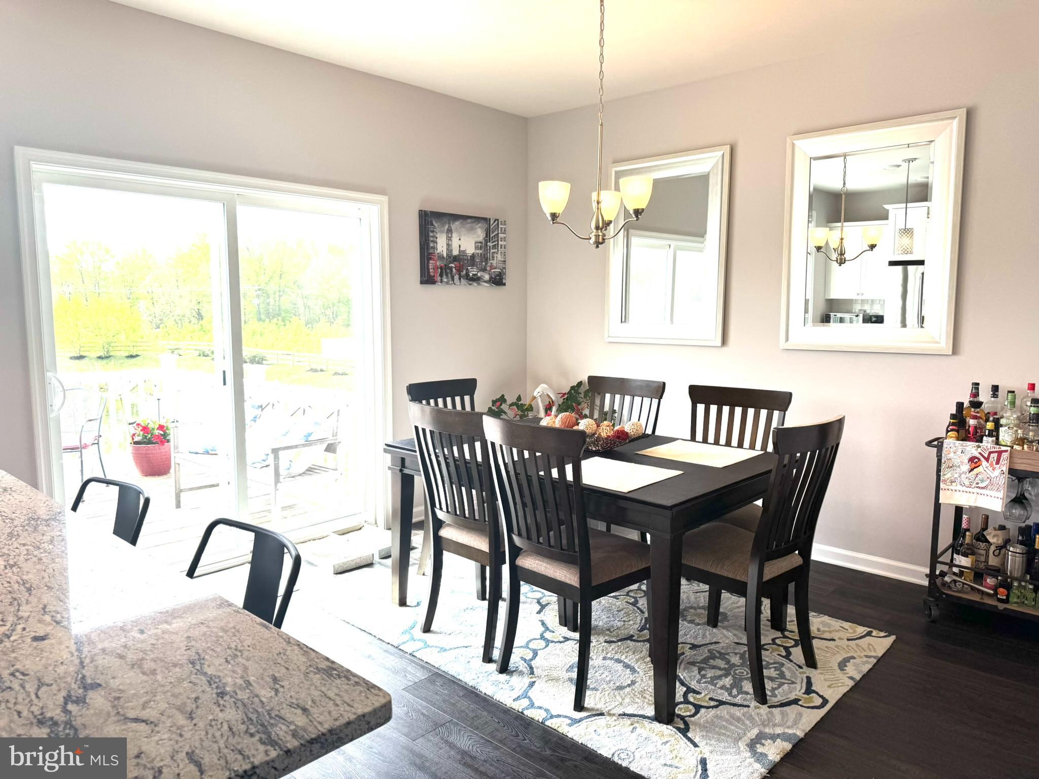 15 Turin Way Mount Laurel, NJ 08054 - Photo 7 of 36 a view of a dining room with furniture and wooden floor