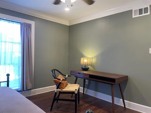 a view of a livingroom with furniture and window