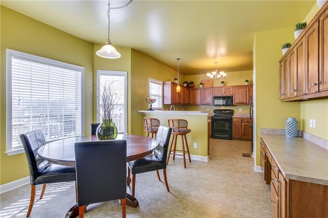3049 Romain Trail Spring Hill, TN 37174 - Photo 7 of 20 Breakfast and Kitchen Area. There is a built in desk in this Area.