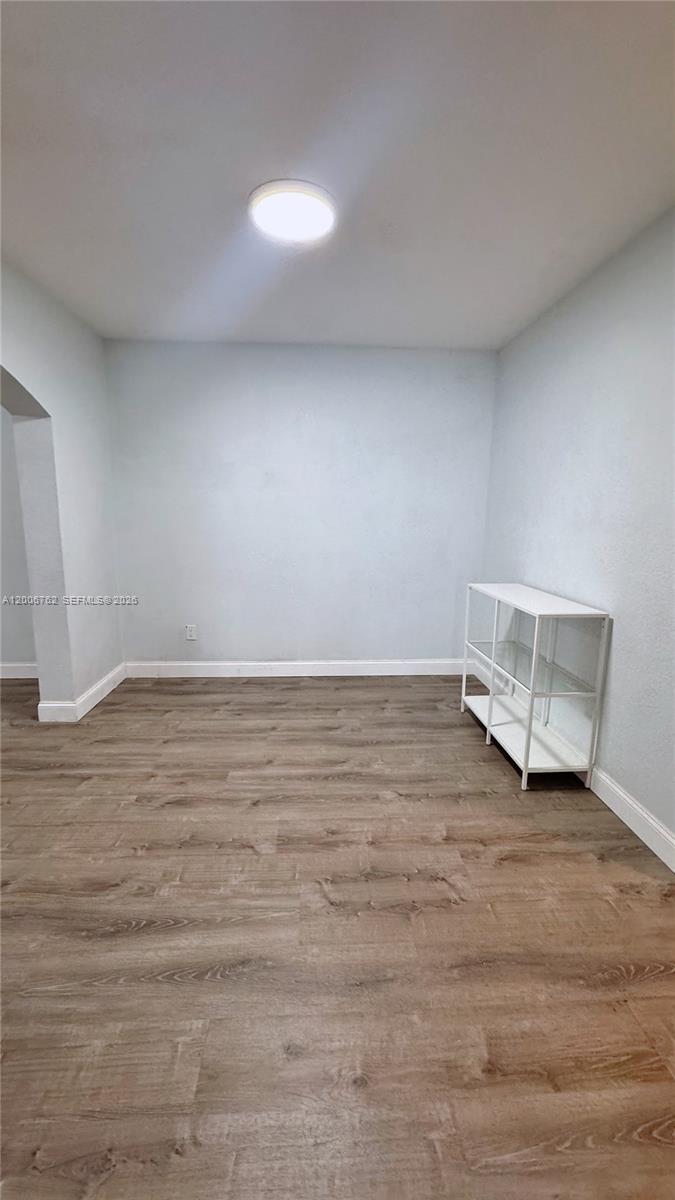 15810 Southwest 40th Street, Unit 57 Miramar, FL 33027 - Photo 6 of 20 a view of room and hardwood floor