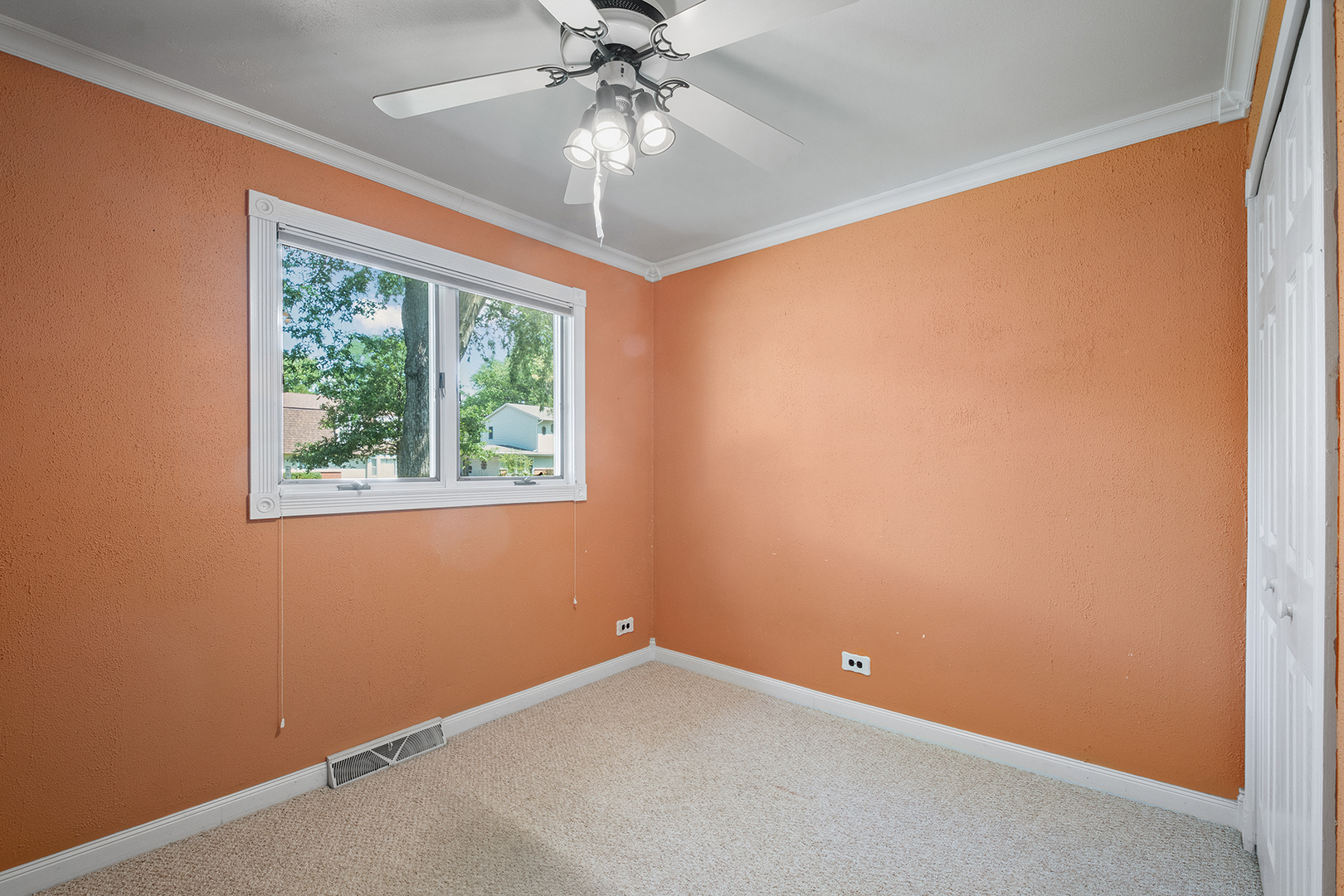 2305 Fulle Street Rolling Meadows, IL 60008 - Photo 11 of 15 an empty room with a window and a fan