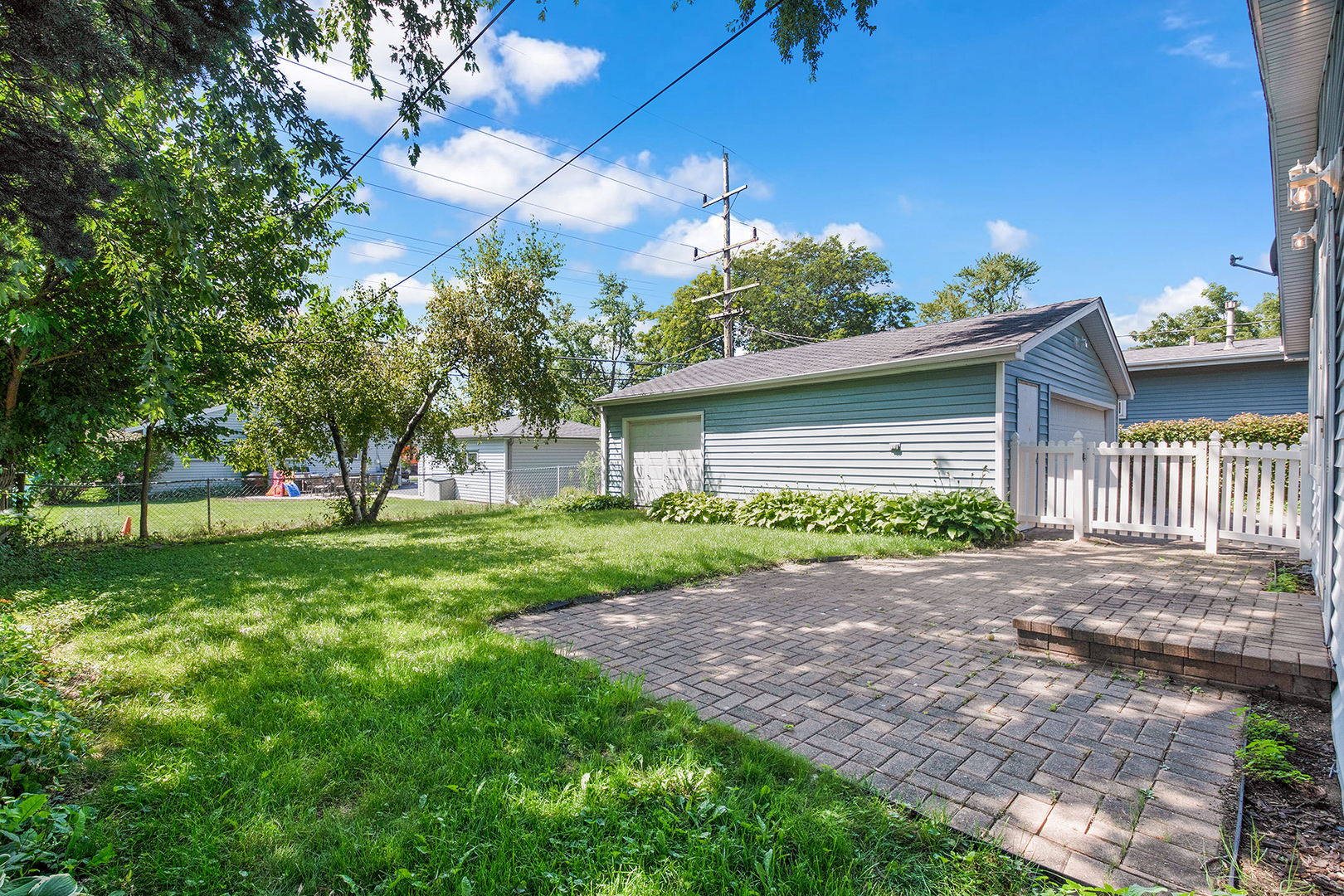 2305 Fulle Street Rolling Meadows, IL 60008 - Photo 14 of 15 a view of a house with a yard