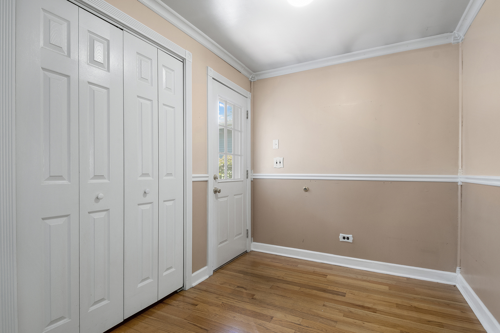 2305 Fulle Street Rolling Meadows, IL 60008 - Photo 2 of 15 an empty room with wooden floor
