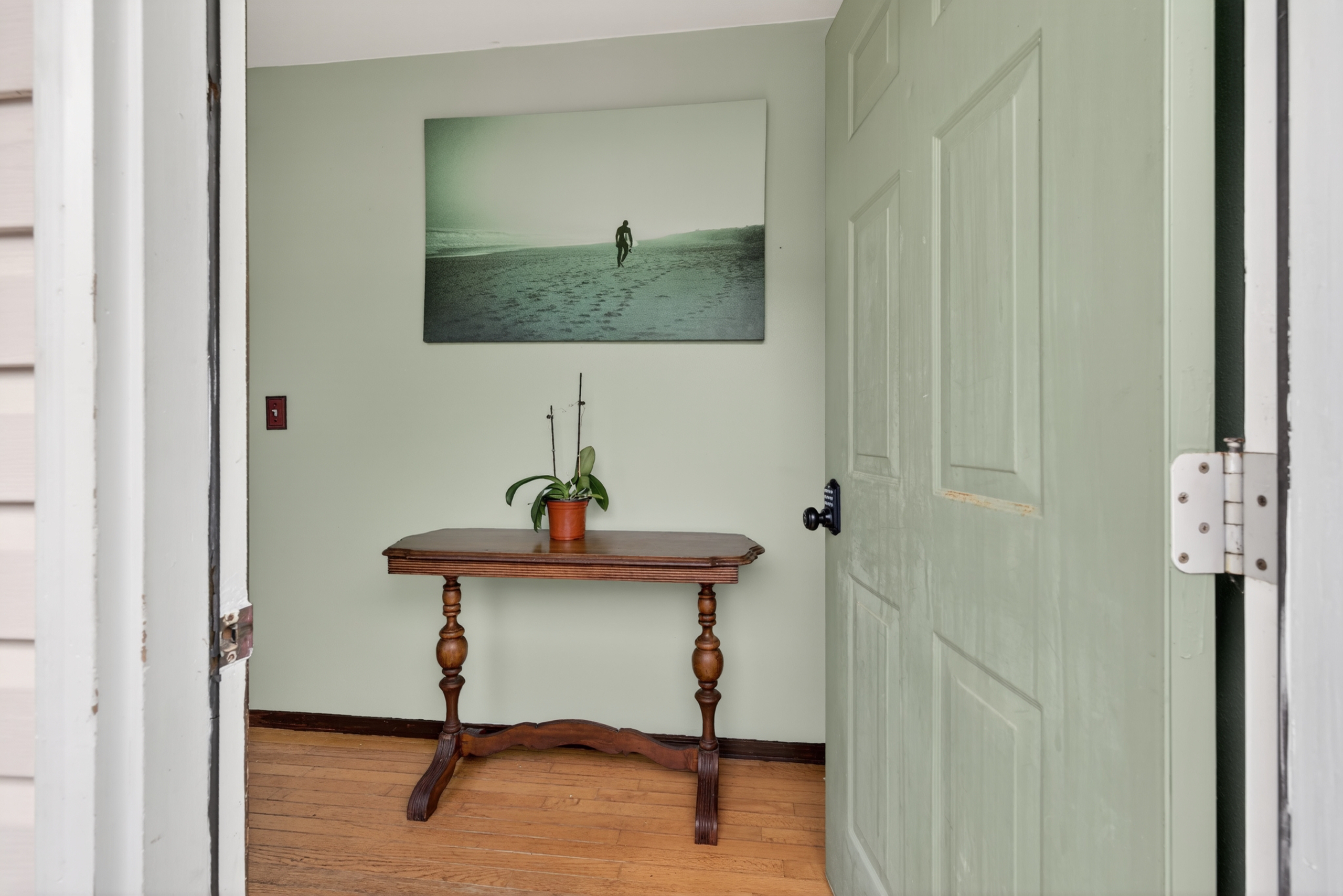 87-299 Kaohe Road Captain Cook, HI 96704 - Photo 5 of 30 a view of a room with a table and a mirror