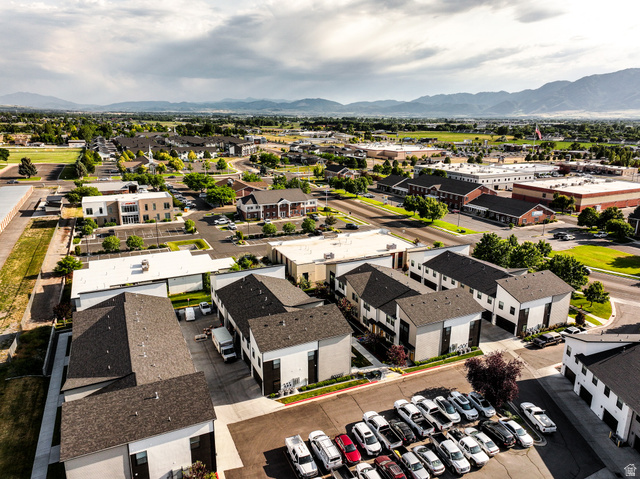 220 Spring Creek Parkway Providence, UT 84332 - Photo 11 of 26 Contemporary multi-story townhomes featuring modern facades and individual garages
