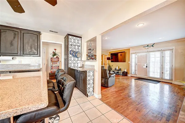 a view of a living room and dining room