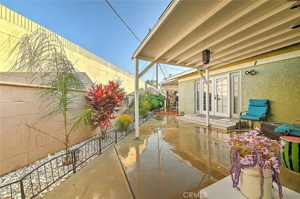 a view of a swimming pool with a patio