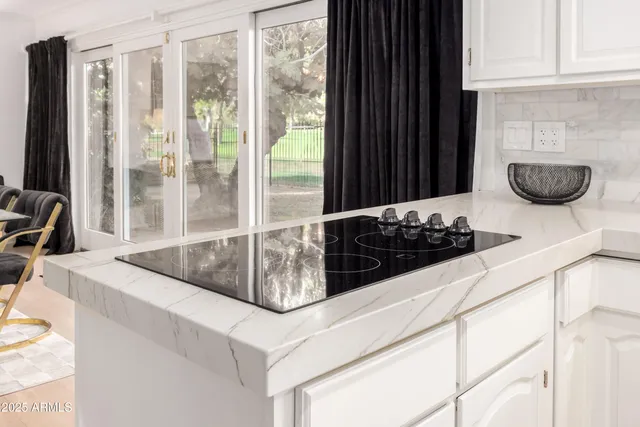 a bathroom with a toilet and a bathtub