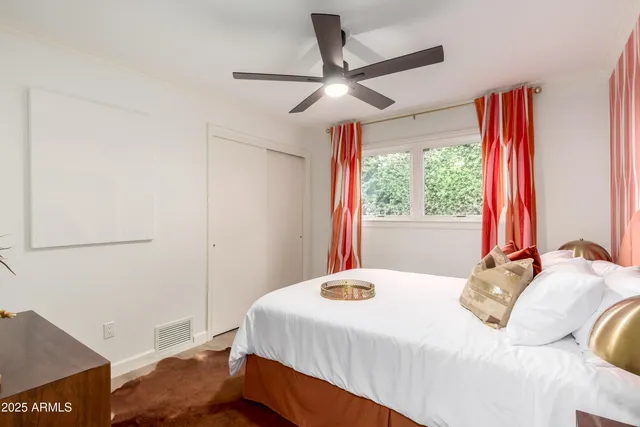 a view of a livingroom with furniture and a flat screen tv