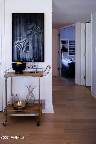 a view of a patio with couches chairs potted plants and a yard