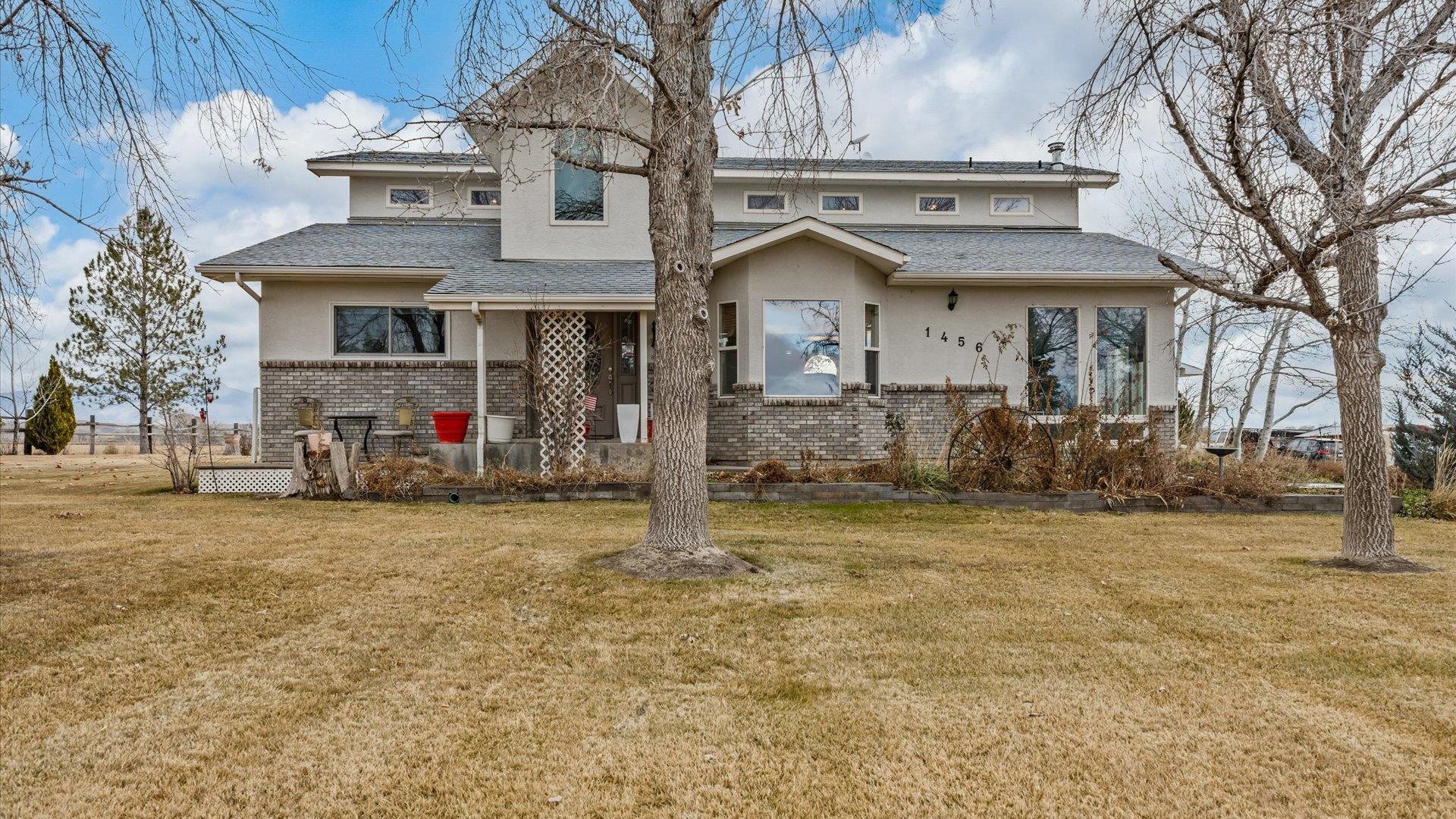 1456 17 Road Fruita, CO 81521 - Photo 2 of 42 a view of a house with a snow in the yard
