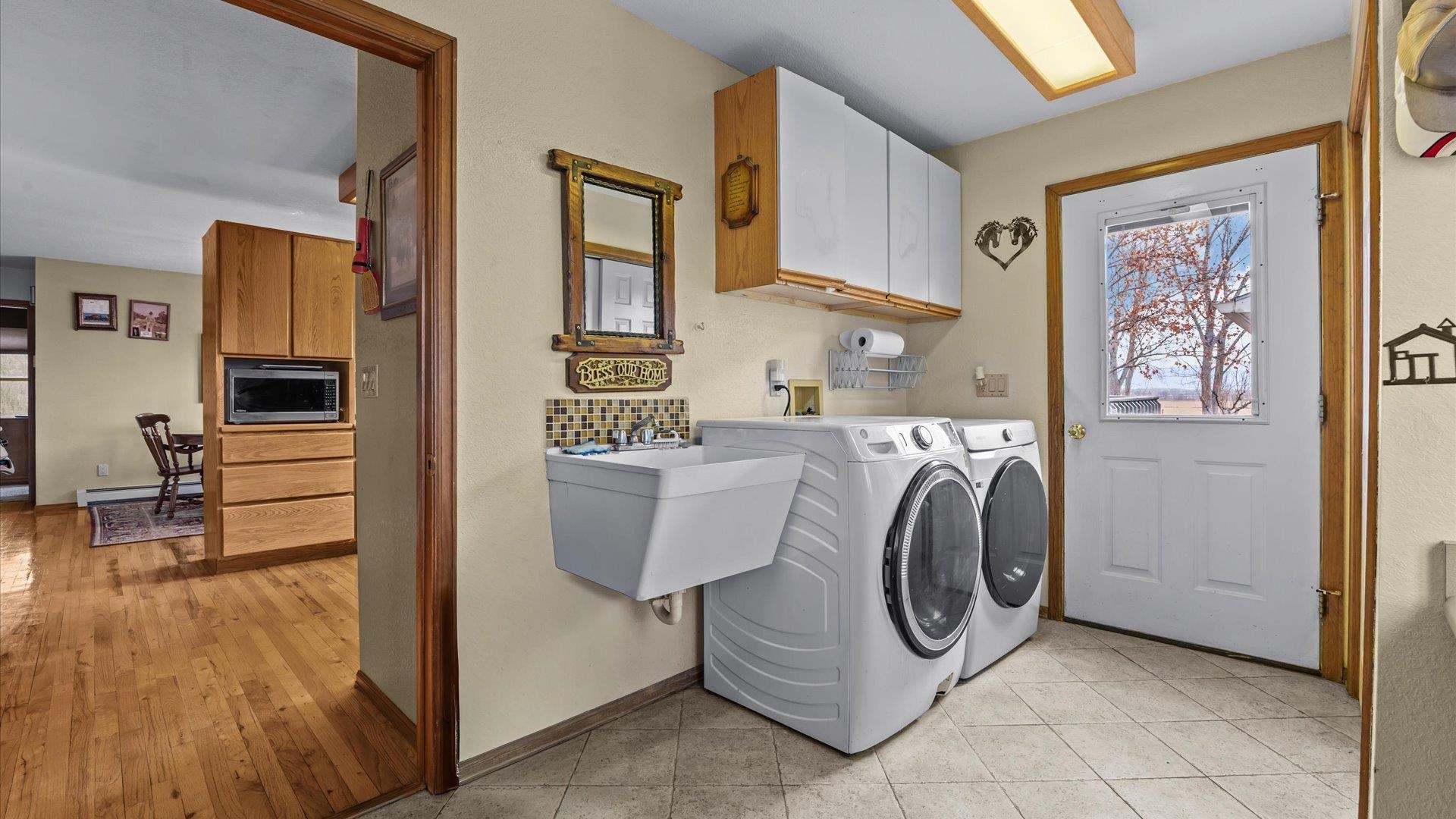 1456 17 Road Fruita, CO 81521 - Photo 27 of 42 a utility room with dryer and washer