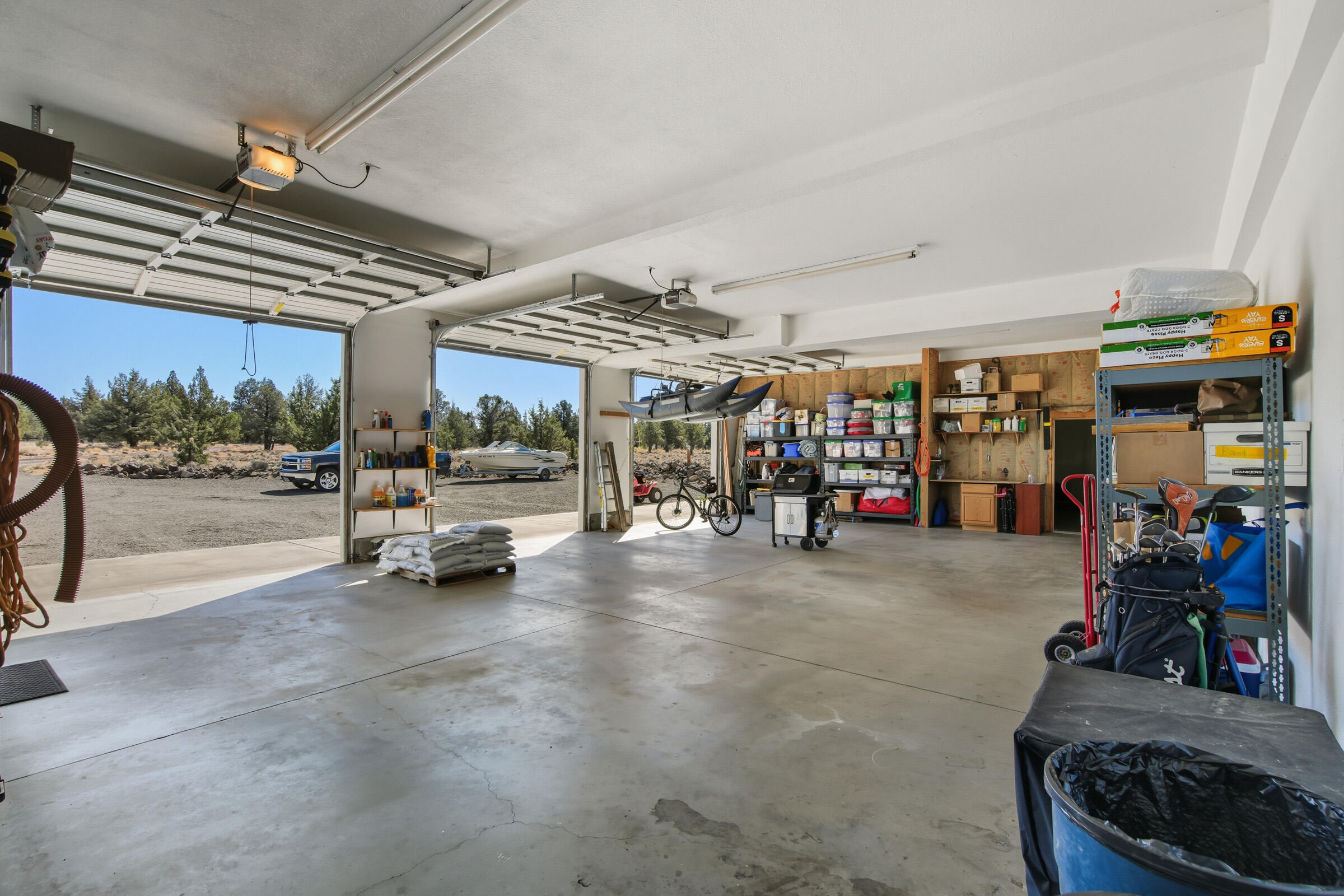 9813 Geneva View Road Terrebonne, OR 97760 - Photo 33 of 43 deep garage with 3 bays