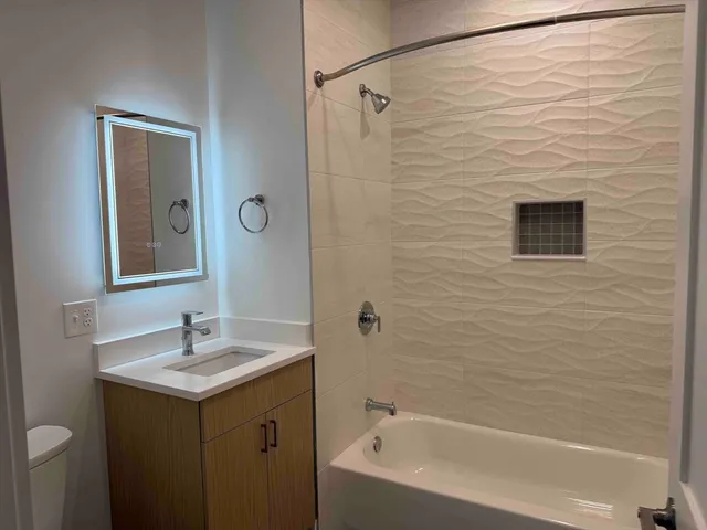 a front view of a building with lot of windows