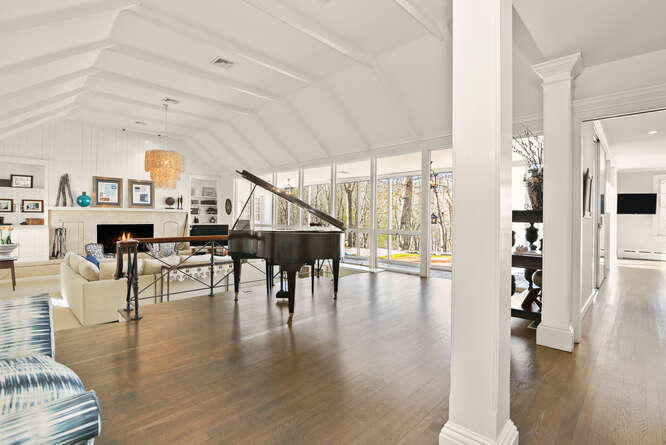 67 Hickok Road New Canaan, CT 06840 - Photo 1 of 56 a living room with furniture and wooden floor