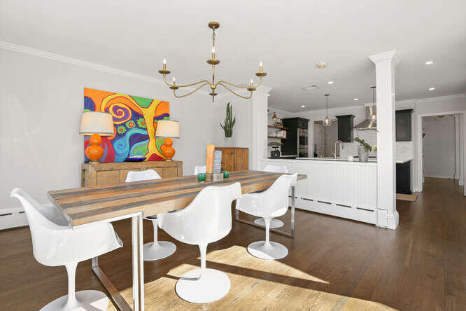 67 Hickok Road New Canaan, CT 06840 - Photo 15 of 56 a view of a dining room with furniture and wooden floor