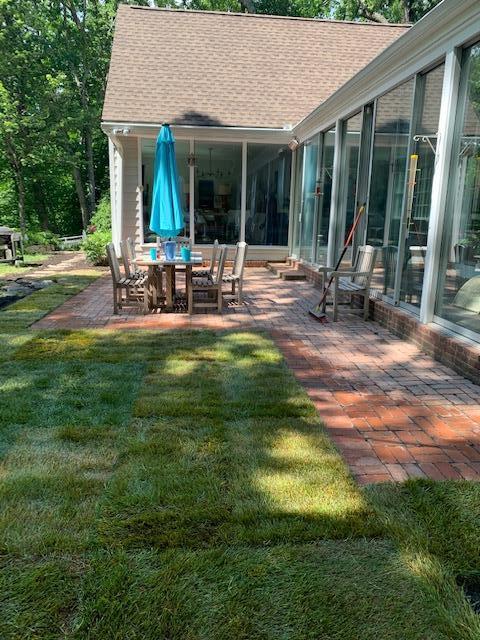 67 Hickok Road New Canaan, CT 06840 - Photo 20 of 56 a view of a house with backyard porch and sitting area