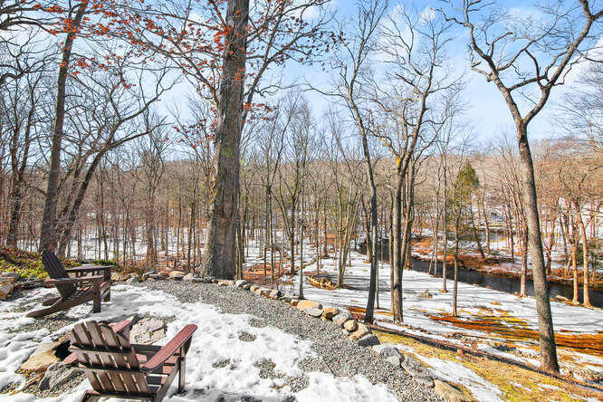 67 Hickok Road New Canaan, CT 06840 - Photo 25 of 56 firepit river shot