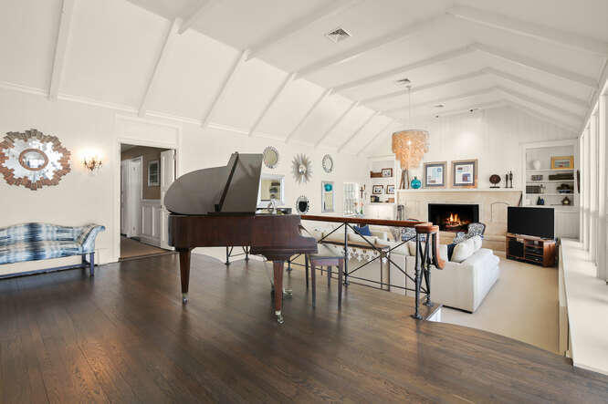 67 Hickok Road New Canaan, CT 06840 - Photo 4 of 56 a living room with furniture and a fireplace