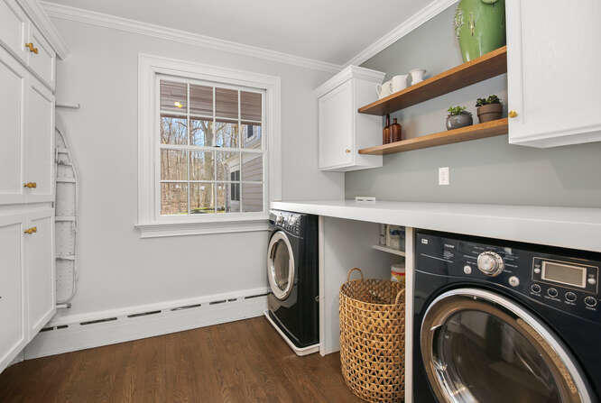 67 Hickok Road New Canaan, CT 06840 - Photo 34 of 56 a utility room with dryer and washer