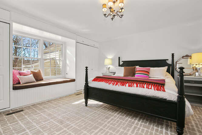 67 Hickok Road New Canaan, CT 06840 - Photo 35 of 56 a bedroom with a bed and window