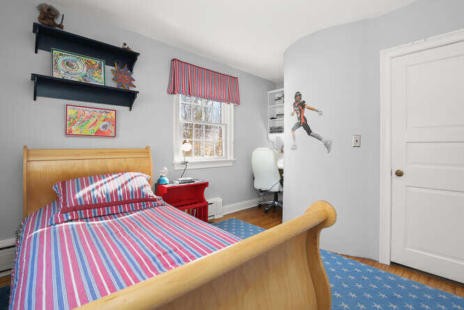 67 Hickok Road New Canaan, CT 06840 - Photo 42 of 56 a bedroom with furniture and a window