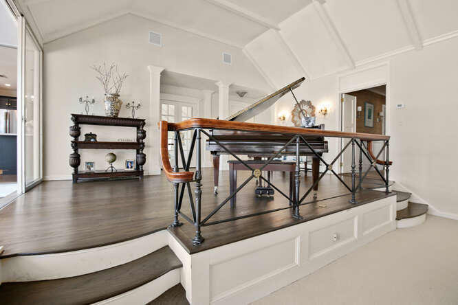 67 Hickok Road New Canaan, CT 06840 - Photo 9 of 56 a view of a room with gym equipment