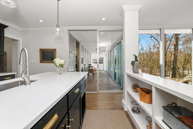 67 Hickok Road New Canaan, CT 06840 - Photo 10 of 56 a kitchen with stainless steel appliances a sink and stove