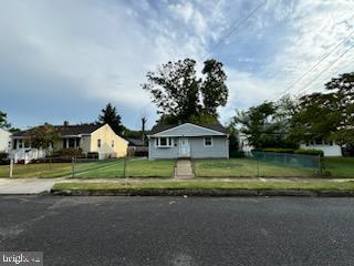 340 9th Avenue Lindenwold, NJ 08021 - Photo 2 of 11 a front view of a house with a yard and garage