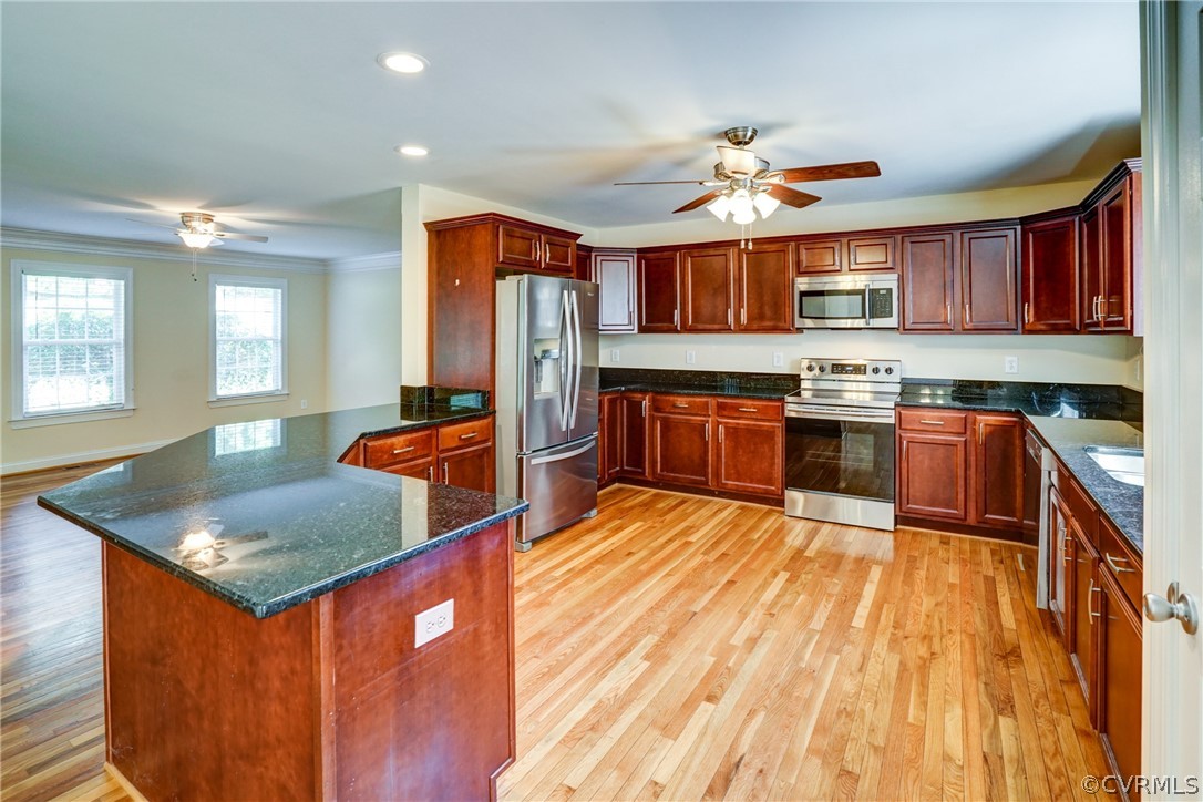 Custom Cabinetry, Granite Countertops, Hardwood Fl