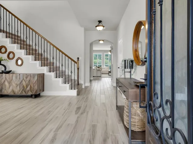 a view of a living room and entryway