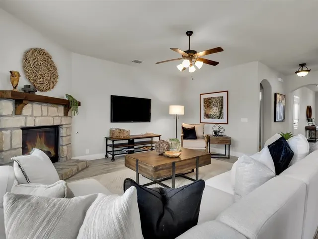 a view of a dining room with furniture and window