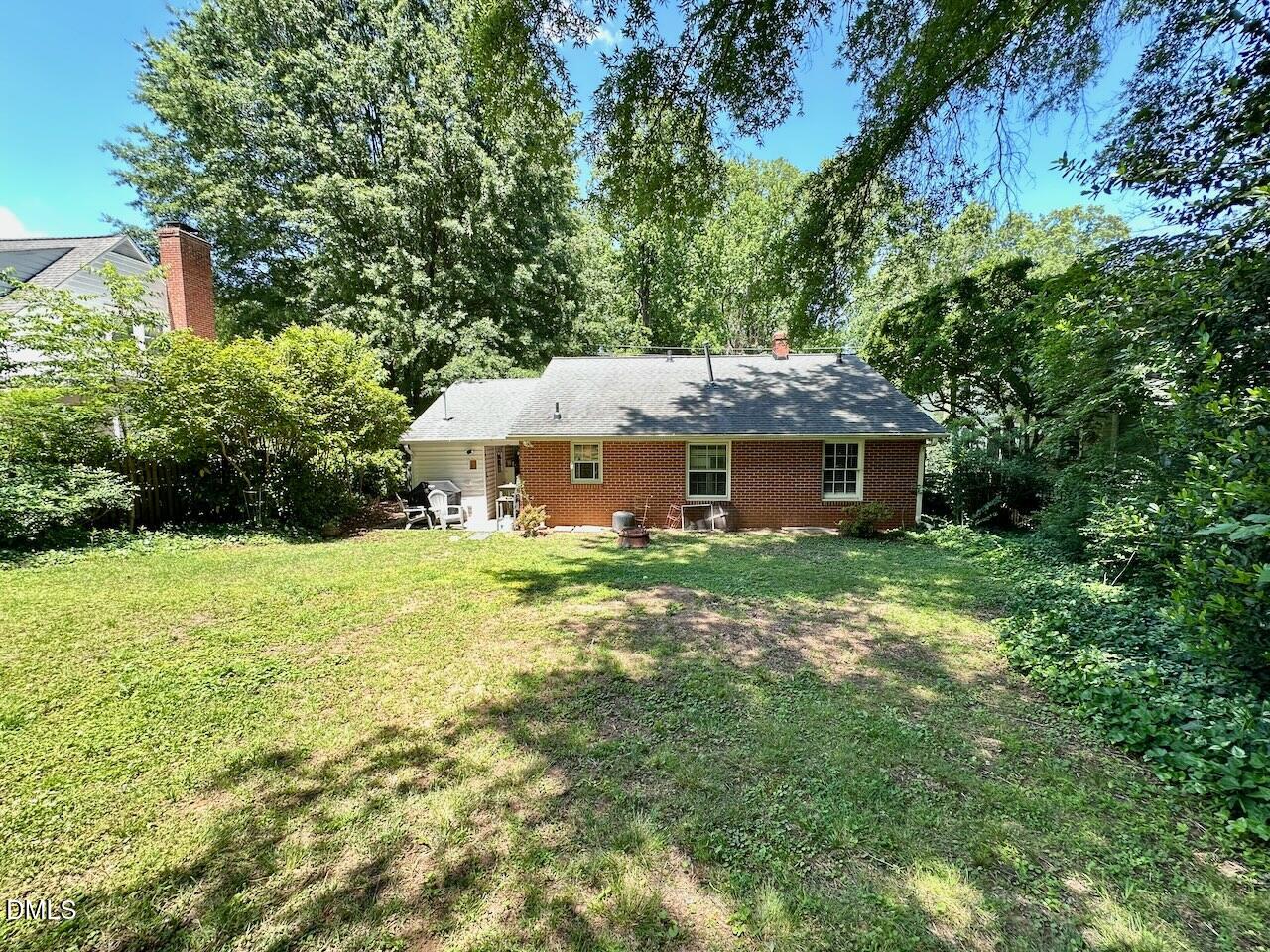 2813 Barmettler Street Raleigh, NC 27607 - Photo 22 of 22 a front view of house with yard and green space