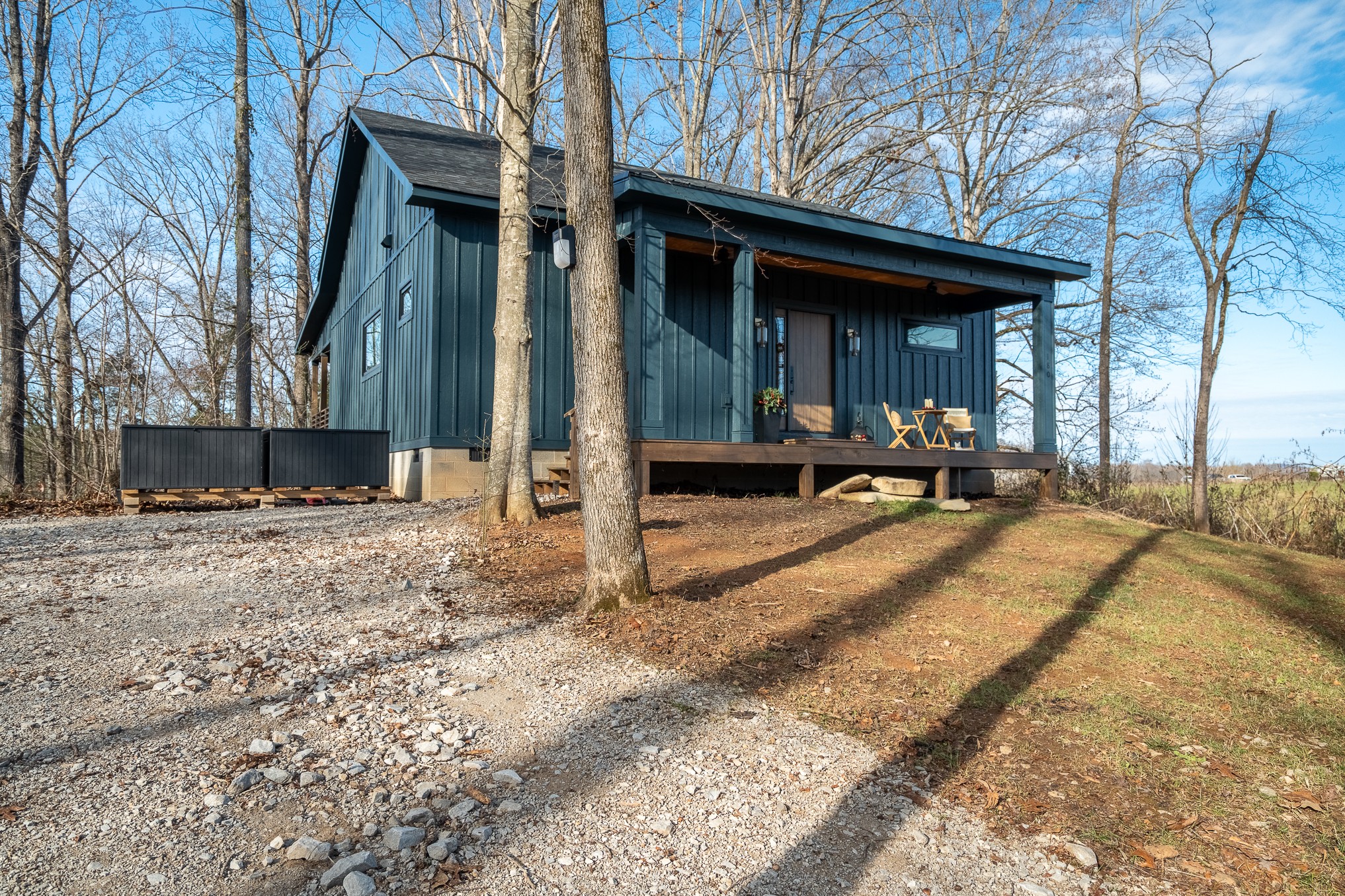 1545 Blue Springs Road Sparta, TN 38583 - Photo 2 of 99 a view of a house with backyard and sitting area