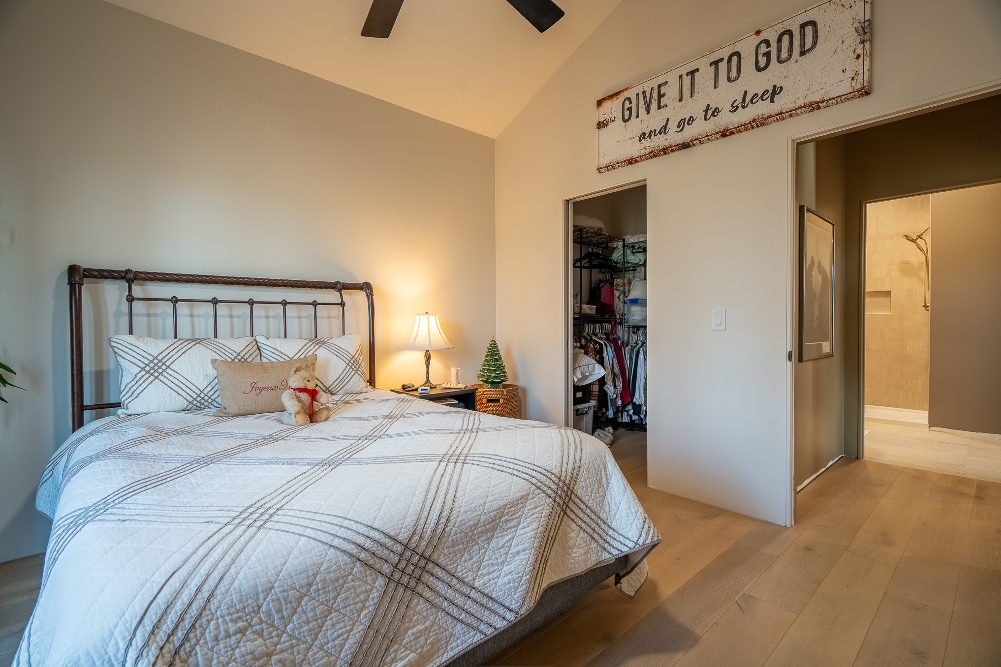 1545 Blue Springs Road Sparta, TN 38583 - Photo 26 of 99 a bedroom with a large bed and a chandelier