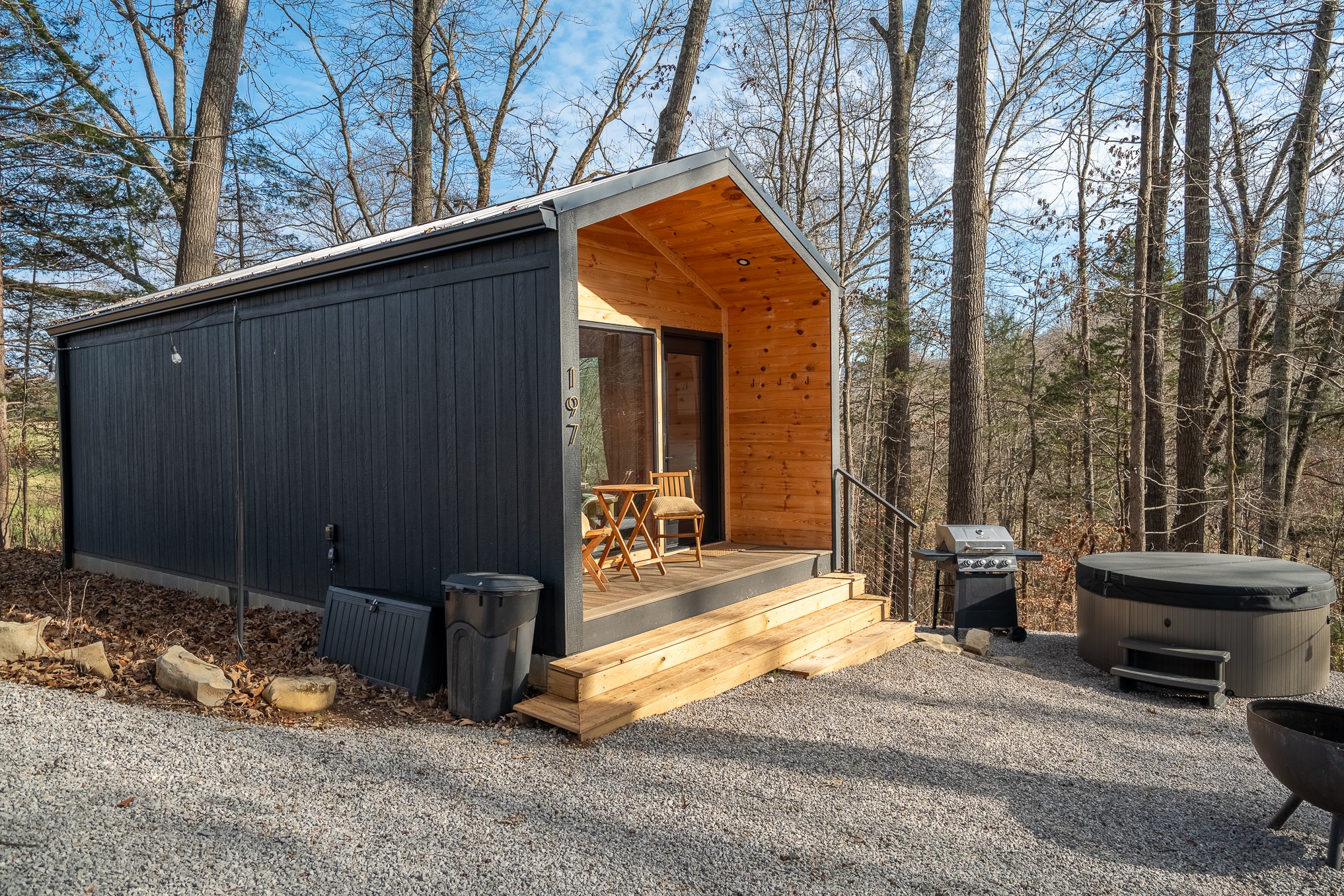 1545 Blue Springs Road Sparta, TN 38583 - Photo 44 of 99 a backyard of a house with barbeque oven and outdoor seating